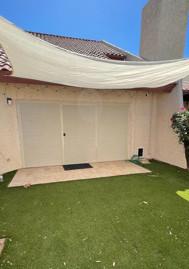 Heavy-duty sliding screen door installed on a patio in Tempe, Arizona